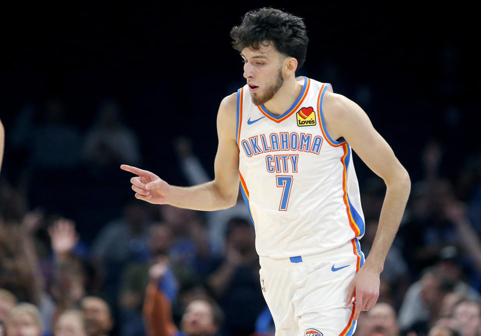 Oklahoma City Thunder forward Chet Holmgren (7) reacts after a 3-point basket in the first half of a preseason NBA basketball game, Monday, Oct. 9, 2023, in Oklahoma City. (AP Photo/Sarah Phipps)