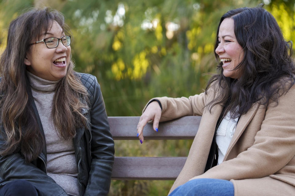 Anna Wong, niece of the late actress Anna May Wong, left, poses with Shannon Lee, daughter of the late martial arts actor Bruce Lee, at Douglas Park in Santa Monica, Calif., on Tuesday, March 7, 2023. They both discovered parallel experiences protecting the legacy of a family member who happens to be a Hollywood and Asian American icon. (AP Photo/Damian Dovarganes)