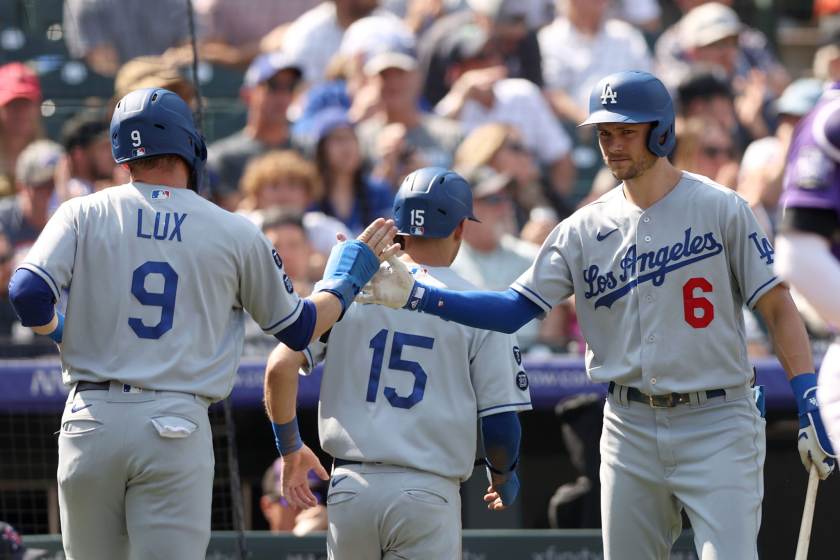 DENVER, COLORADO - SEPTEMBER 23: Gavin Lux #9 and Austin Barnes #15 of the Los Angeles Dodgers.