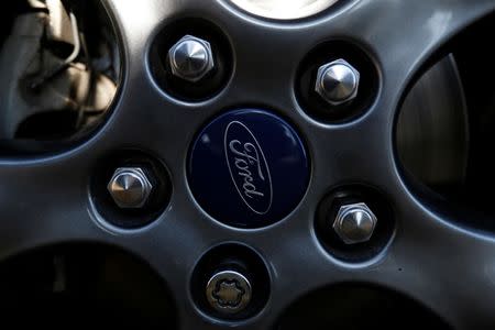 The Ford logo is seen in a rim of car in Cuautitlan Izcalli, Mexico January 4, 2017. REUTERS/Carlos Jasso