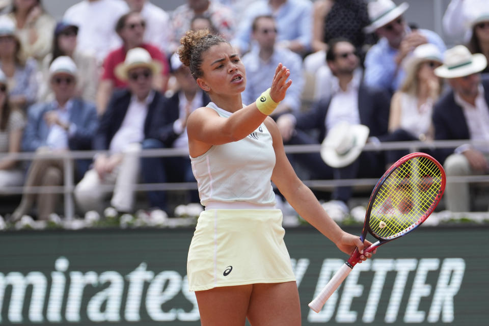 Italy's Jasmine Paolini reacts after missing a shot against Poland's Iga Swiatek during the women's final of the French Open tennis tournament at the Roland Garros stadium in Paris, France, Saturday, June 8, 2024. (AP Photo/Thibault Camus)