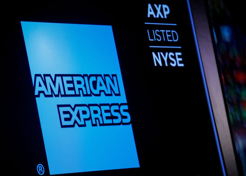 FILE PHOTO: American Express logo and trading symbol are displayed on a screen at the NYSE in New York