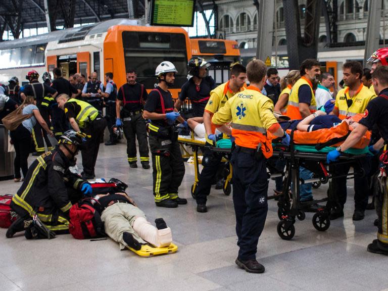 Barcelona train crash injures 54 after carriage smashes into station platform