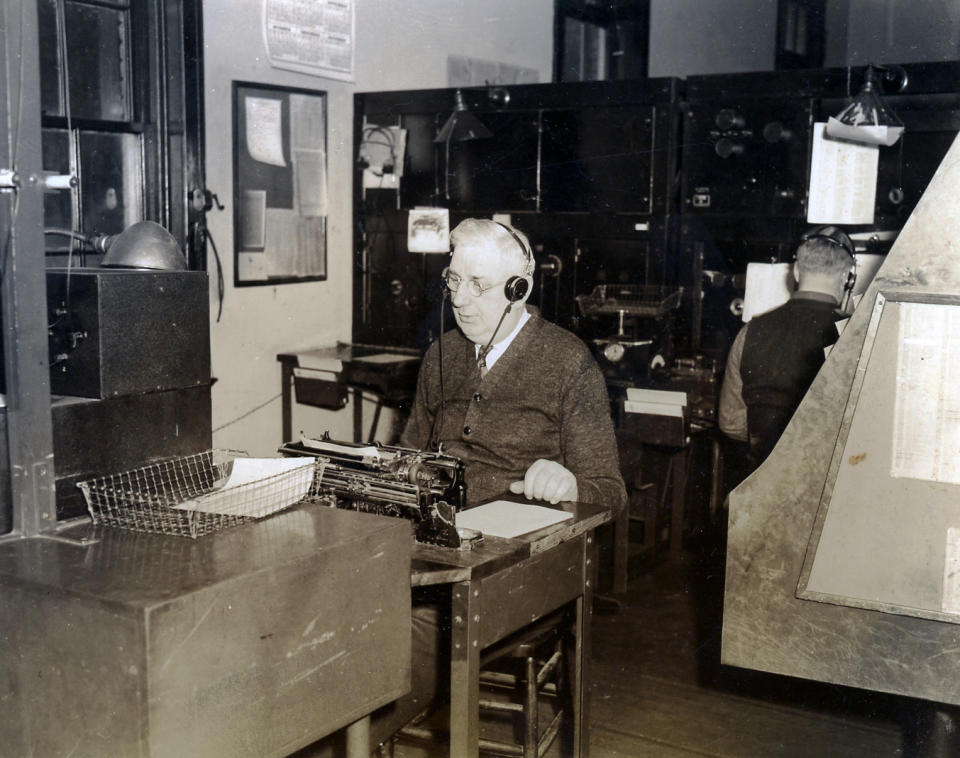 This circa 1950 photo, location unknown, provided by Bill Upham shows his grandfather, Matt Tierney sitting at a typewriter. Tierney was working the night shift at a station on the Massachusetts island of Nantucket on April 14, 1912, when he heard a faint distress signal from the Titanic, which he relayed to New York. For several days after the sinking, he transmitted messages containing information about who had survived, and who had been lost. (AP Photo/Robert P. Tierney via Bill Upham)