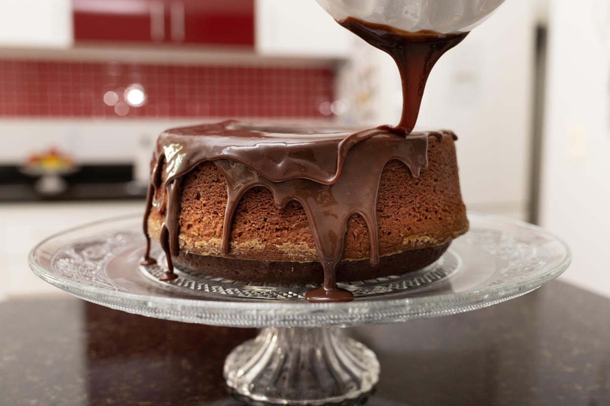 Chocolate cake with melting chocolate icing.