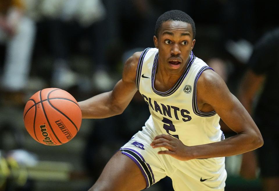 Ben Davis Giants guard Mark Zackery (2) rushes upon the court Saturday, March 18, 2023 at New Castle Fieldhouse in New Castle. The Ben Davis Giants defeated the Brownsburg Bulldogs, 66-38, for the IHSAA Class 4A Semistate championship game. 