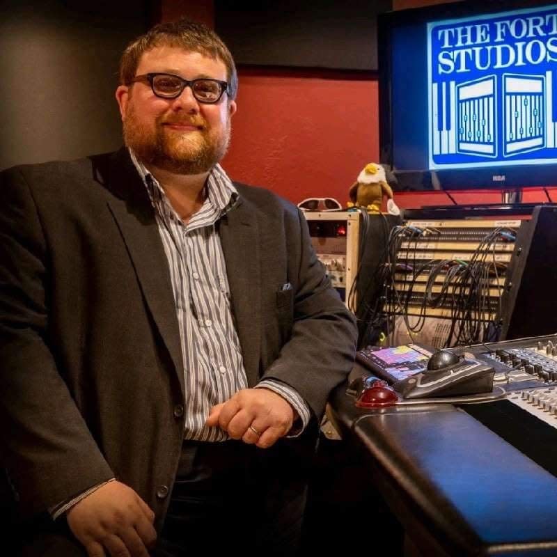 Julian Sundby mans the soundboard at The Fort Studios in Fort Myers.