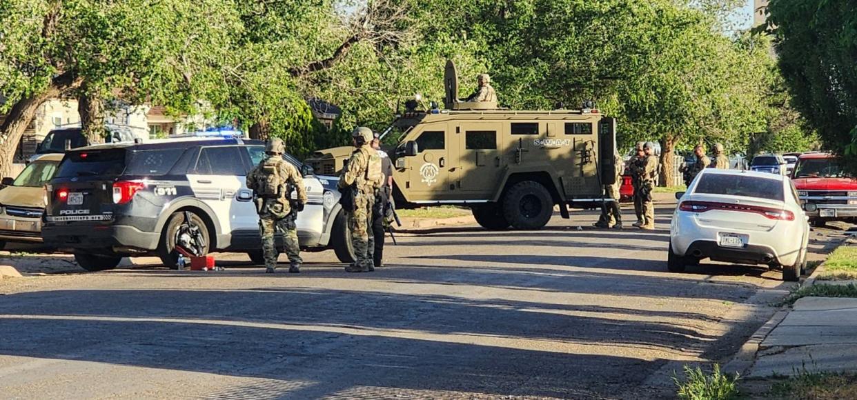 Amarillo police negotiators and the Critical Incident Response Team are working to get a person barricaded inside a residence to exit the building Wednesday evening in east Amarillo in the 1200 block of North Roosevelt Street.