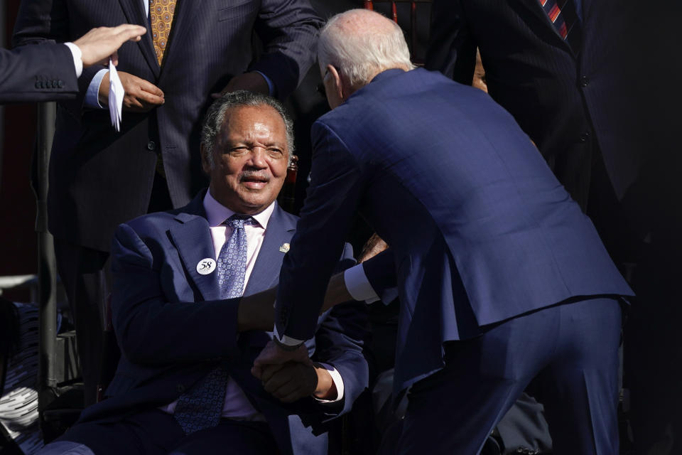 President Joe Biden greets the Rev. Jesse Jackson in Selma, Ala., Sunday, March 5, 2023, as he arrives to commemorate the 58th anniversary of "Bloody Sunday," a landmark event of the civil rights movement. (AP Photo/Patrick Semansky)