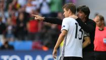 Reaching the last eight in France means Germany coach Joachim Loew (R) is in no danger of being relieved of his duties through to the 2018 World Cup finals, when his current contract expires