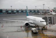 SilkAir's new aircraft, the Boeing 737 Max 8, sits on the tarmac at Changi Airport in Singapore October 4, 2017. REUTERS/Edgar Su/Files