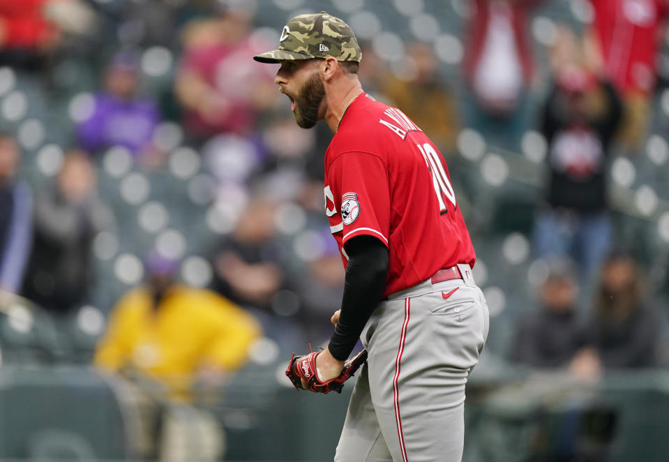 Cincinnati Reds relief pitcher Tejay Antone reacts after getting Colorado Rockies' Garrett Hampson to ground into a double play to end the ninth inning of a baseball game Sunday, May 16, 2021, in Denver. (AP Photo/David Zalubowski)