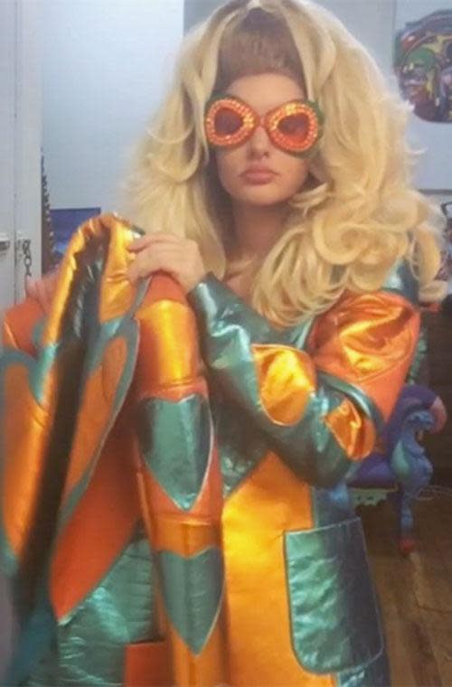 <p>Peace out! The fembot goes back in time with a sixties inspired outfit! Along with matching sunnies! #groovybaby</p>