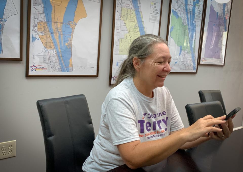 Joanne Terry of Satellite Beach, candidate in the Democratic primary for U.S. House in District 8, works the phone bank at the Brevard Democrats office before heading back out to campaign.