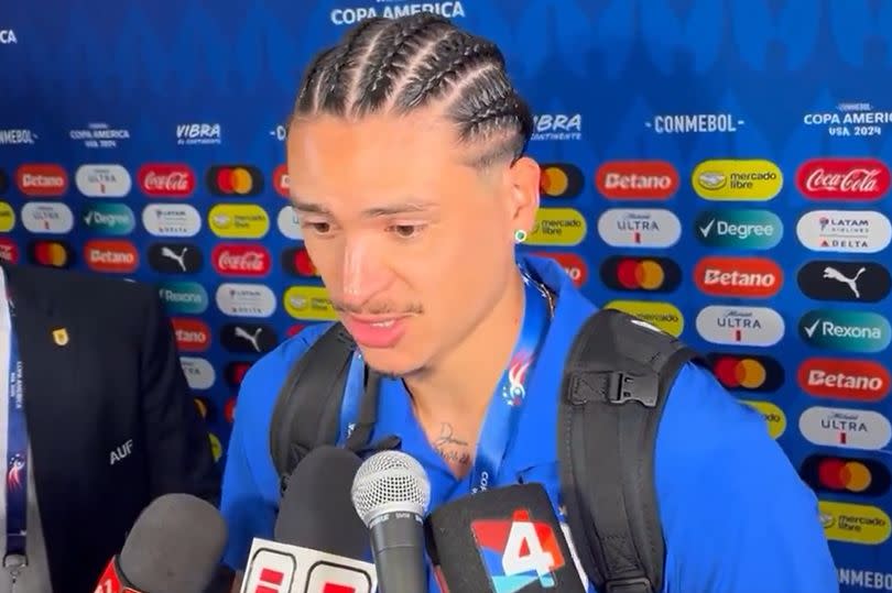 Liverpool striker Darwin Nunez is interviewed in the mixed zone after scoring in Uruguay's Copa America win over Panama