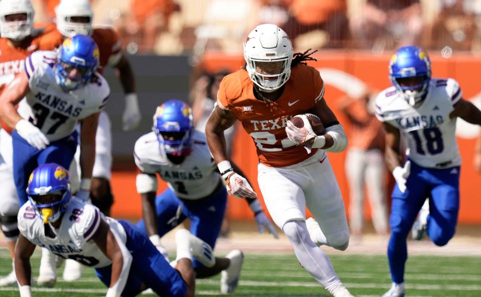 Texas Longhorns running back Jonathon Brooks makes a long run against the <a class="link " href="https://sports.yahoo.com/ncaaw/teams/kansas/" data-i13n="sec:content-canvas;subsec:anchor_text;elm:context_link" data-ylk="slk:Kansas Jayhawks;sec:content-canvas;subsec:anchor_text;elm:context_link;itc:0">Kansas Jayhawks</a> in the second quarter at Royal-Memorial Stadium on Saturday September 30, 2023.