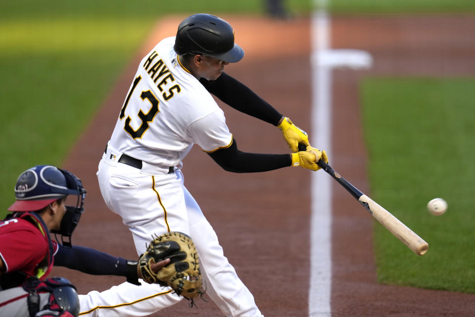 Pittsburgh Pirates' Ke'Bryan Hayes hits an RBI double off Washington Nationals starting pitcher Jackson Rutledge during the first inning of a baseball game in Pittsburgh, Wednesday, Sept. 13, 2023. (AP Photo/Gene J. Puskar)