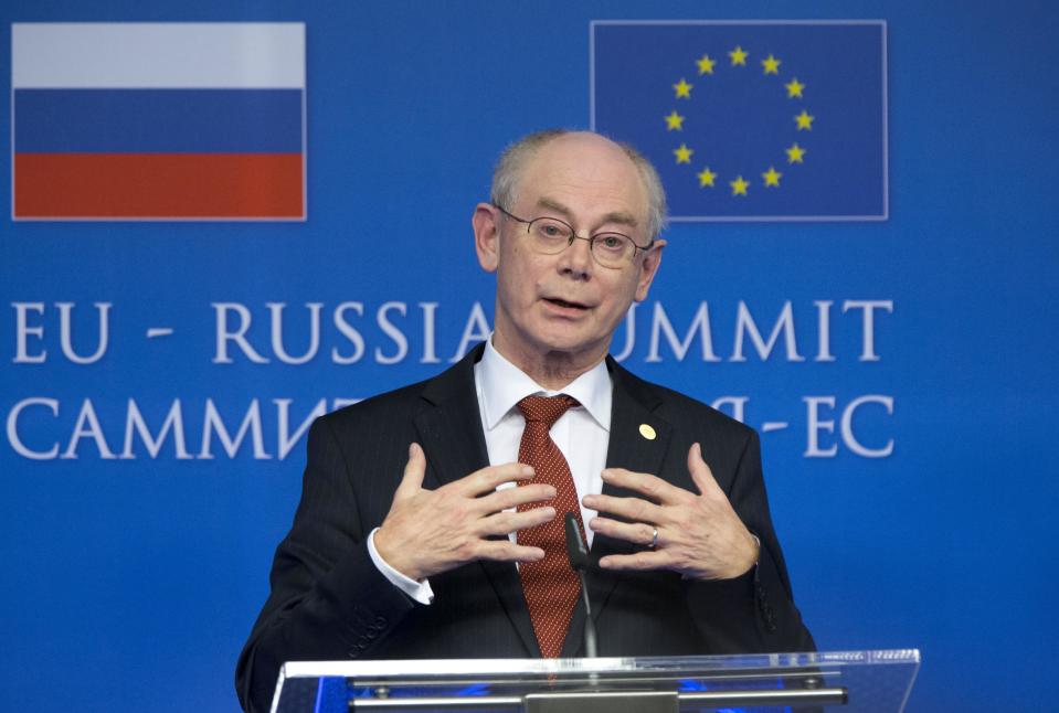 European Council President Herman Van Rompuy gestures during a news conference at the European Commission headquarters in Brussels, Belgium, Tuesday, Jan. 28, 2014. Russian President Vladimir Putin and European Union leaders are looking for meager common ground during what promises to be a difficult summit centering on Ukraine and human rights. (AP Photo/Alexander Zemlianichenko)