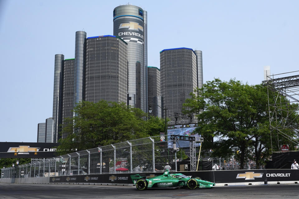 Alex Palou makes a turn during the IndyCar Detroit Grand Prix auto race in Detroit, Sunday, June 4, 2023. (AP Photo/Paul Sancya)