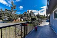 <p><span>7395 Minster Drive South, Delta, B.C.</span><br> The wraparound deck is perfect for enjoying some sunshine outside.<br> (Photo: Zoocasa) </p>