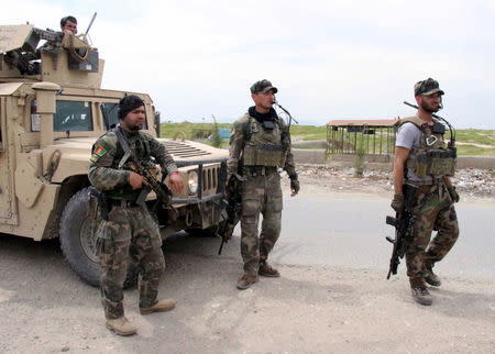 Afghan security forces prepare for battle with the Taliban in Kunduz province, Afghanistan, April 16, 2016. REUTERS/Stringer