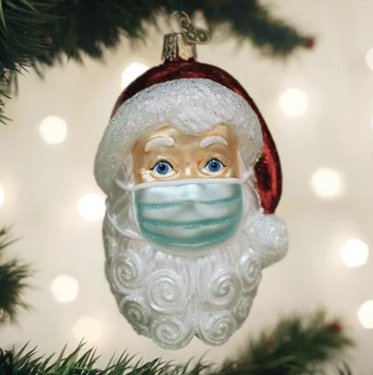 Old World Christmas is selling pandemic-inspired decorations depicting toilet paper, hand sanitizer and this mask-wearing Santa. (Photo: Old World Christmas)