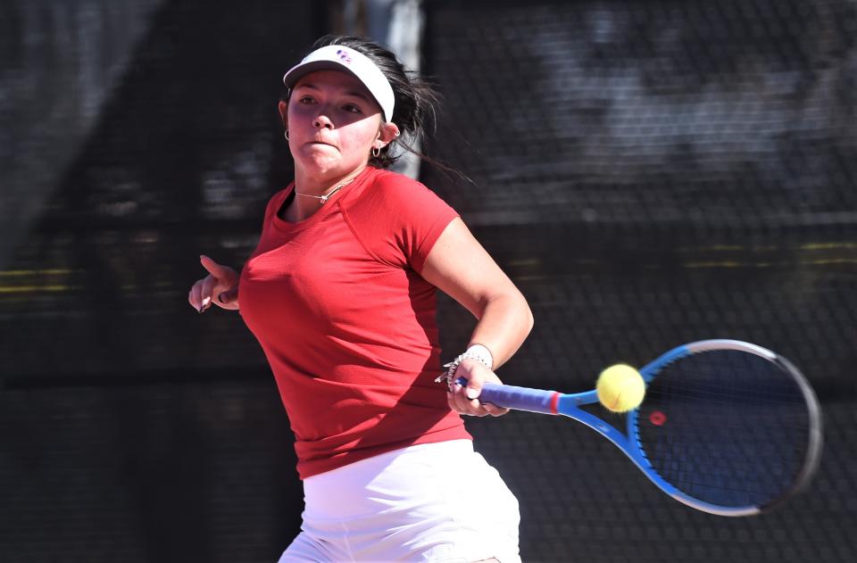 Cooper's Kaylee Connally returns a shot against Aledo's Elli Kate Bussmeir and Paige Federman. Connally and Helena Bridge won the second-round match 4-6, 6-2, 6-0 at the Region I-5A tournament Monday at the McLeod Tennis Center in Lubbock.