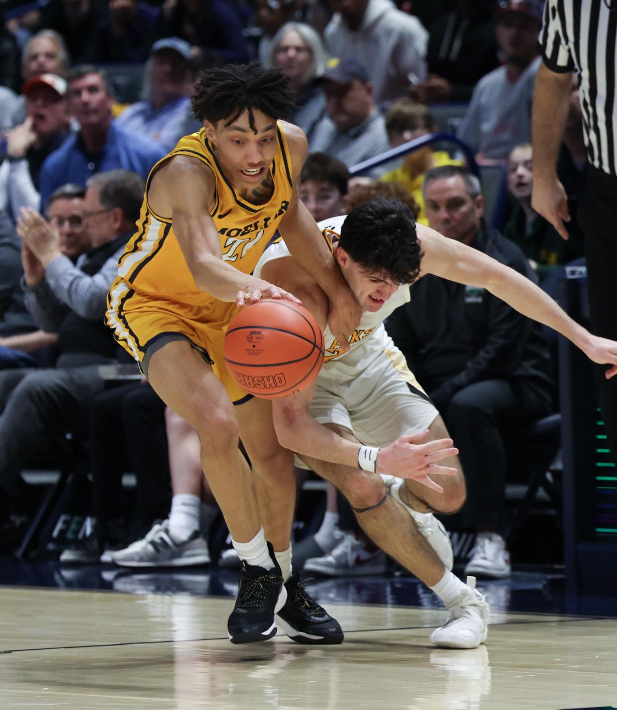 Alex Kazanecki of Moeller is The Enquirer's boys basketball co-player of the year in Division I.