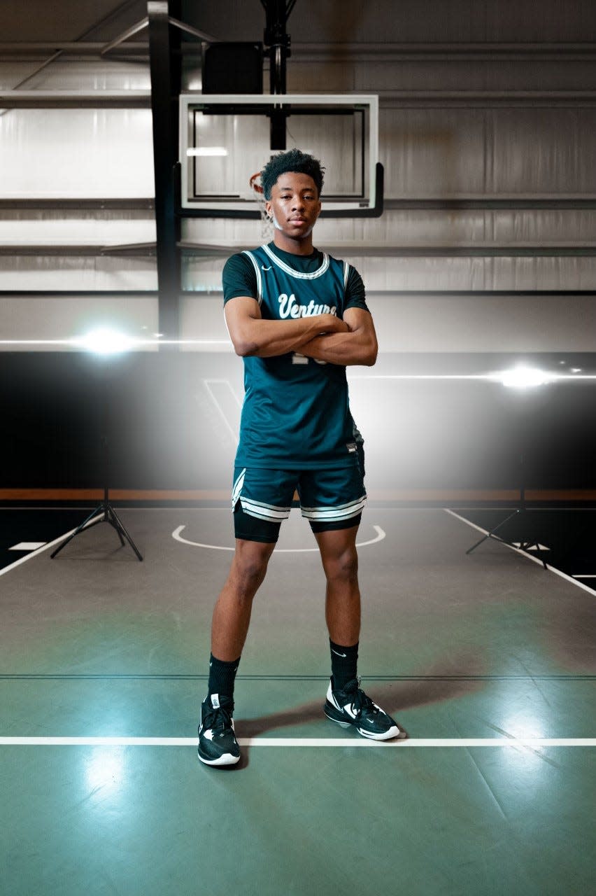 Venture Academy's senior forward Cameron Lowe posses during the team's photo shoot for the 2022-23 season.