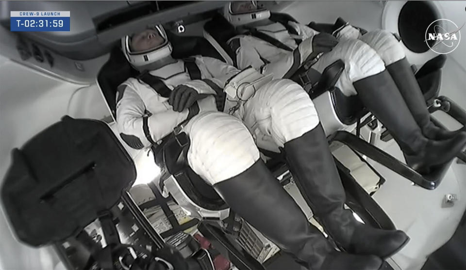 This image provided by NASA shows NASA astronaut Nick Hague and Roscosmos cosmonaut Aleksandr Gorbunov inside the SpaceX capsule on Saturday, Sept. 28, 2024, at the Kennedy Space Center in Cape Canaveral, Fla. / Credit: NASA via AP