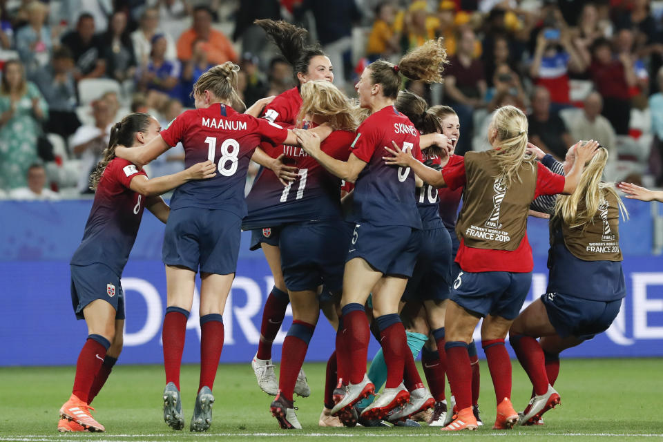 Norway players celebrate after winning the penalty shoot-out of the Women's World Cup round of 16 soccer match between Norway and Australia at the Stade de Nice in Nice, France, Saturday, June 22, 2019. (AP Photo/Thibault Camus)