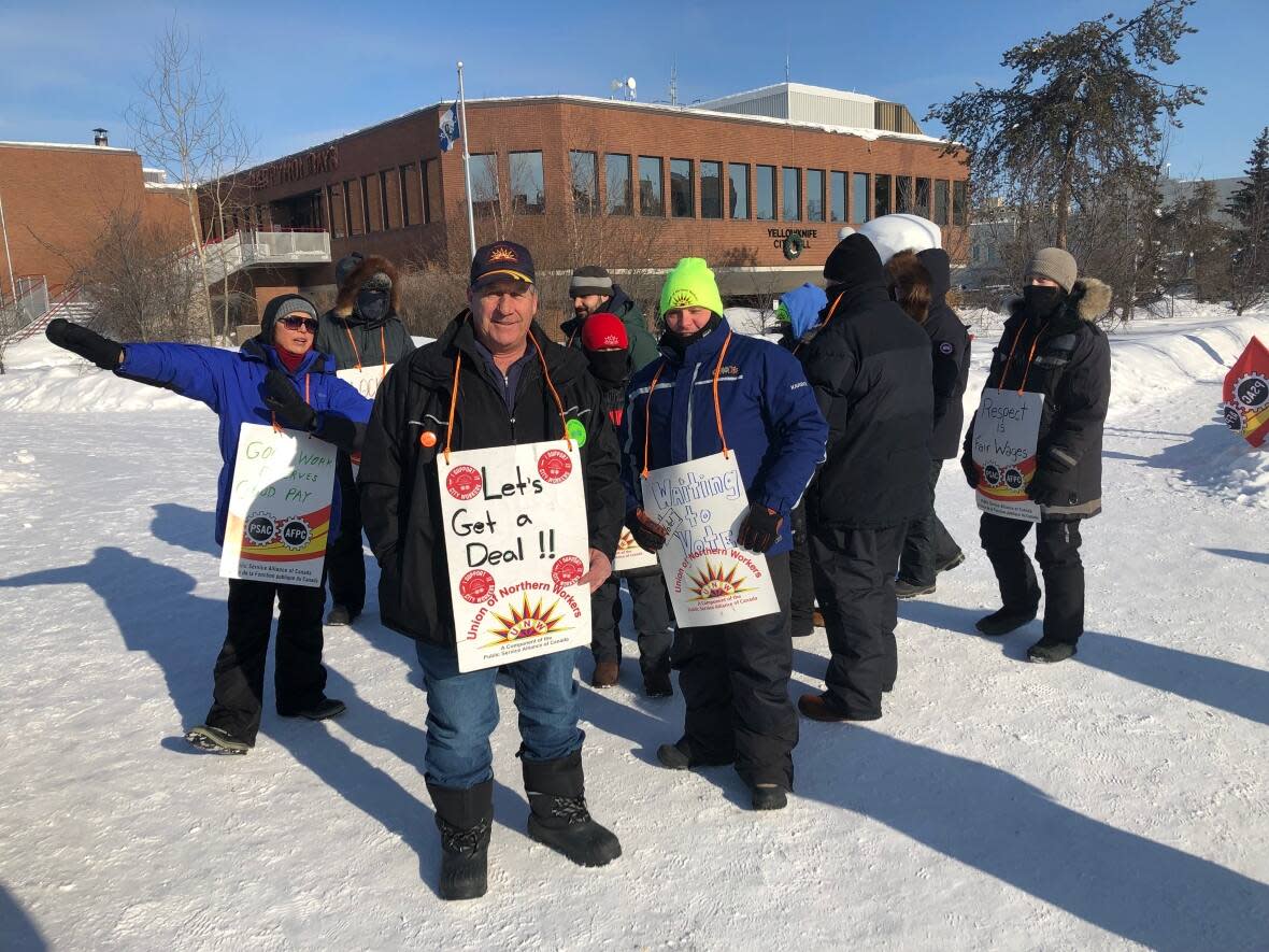 Four days after the City of Yellowknife announced it had reached a tentative agreement with the Public Service Alliance of Canada Local X0345, Daryl Snow, centre, said union members have yet to see the proposed collective agreement. (Sidney Cohen/CBC - image credit)