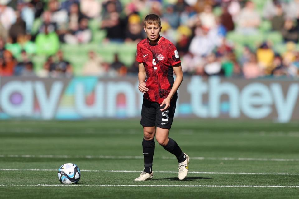 Quinn plays for Canada against Nigeria with the Q Collar (Getty Images)
