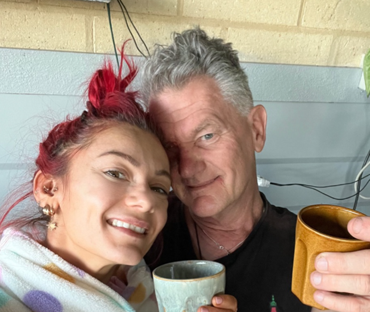 Dianne Buswell has revealed her dad Mark (pictured with her) has completed his chemotherapy treatment (Dianne Buswell/Instagram)
