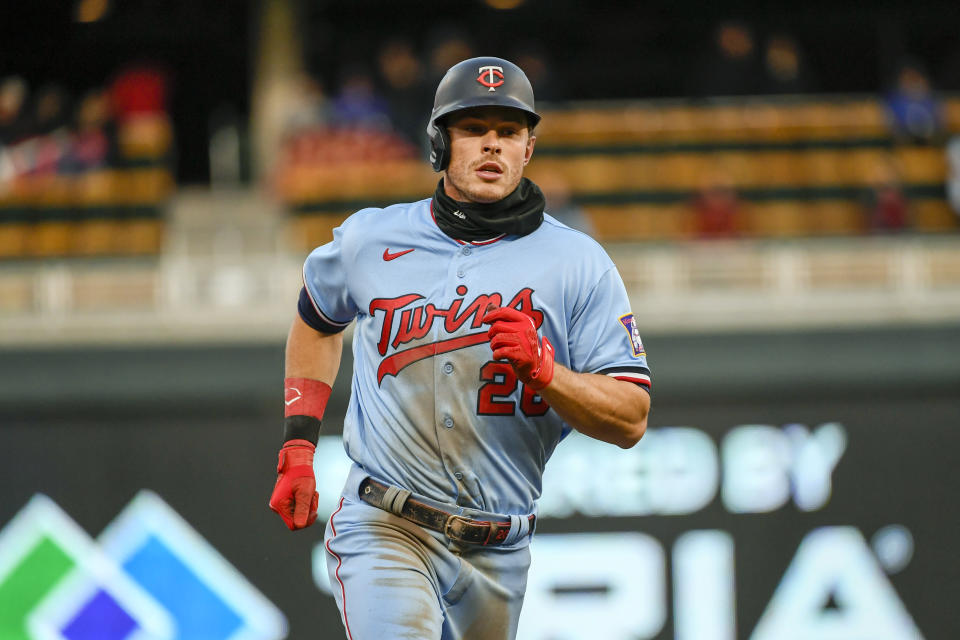 Minnesota Twins' Max Kepler runs the bases after hitting a two-run home run off Detroit Tigers pitcher Eduardo Rodriguez during the fourth inning of a baseball game Tuesday, April 26, 2022, in Minneapolis. (AP Photo/Craig Lassig)