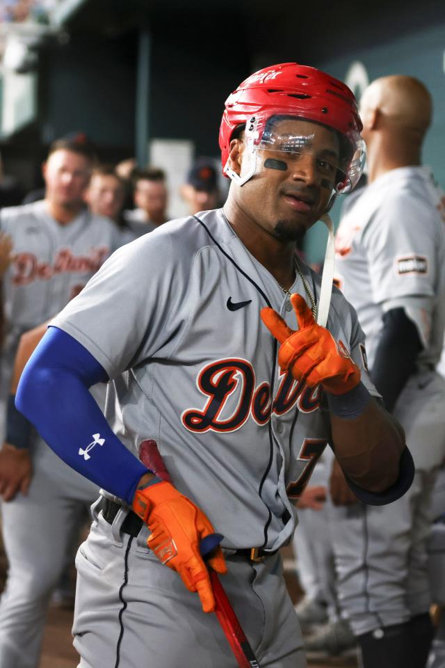 FILE - Detroit Tigers' Andy Ibanez shoots a goal in the dugout after his  solo home run against the Texas Rangers, Tuesday, May 30, 2023, in Detroit.  About half the clubs in