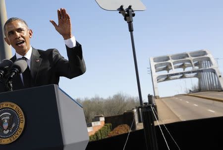 U.S. President Barack Obama delivers remarks at the Edmund Pettus Bridge in Selma, Alabama, March 7, 2015. REUTERS/Jonathan Ernst