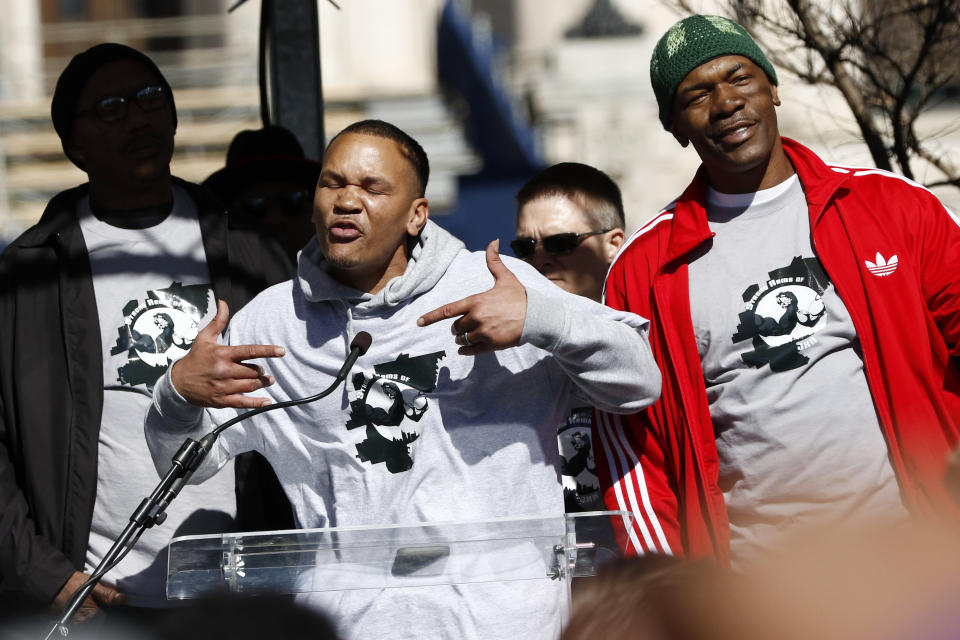 Strong Arms of Jackson co-chair Terun Moore, foreground, expresses himself at a mass gathering in front of the Mississippi Capitol in Jackson, on Friday, Jan. 24, 2020, to protest conditions in prisons where inmates have been killed in violent clashes in recent weeks. (AP Photo/Rogelio V. Solis)