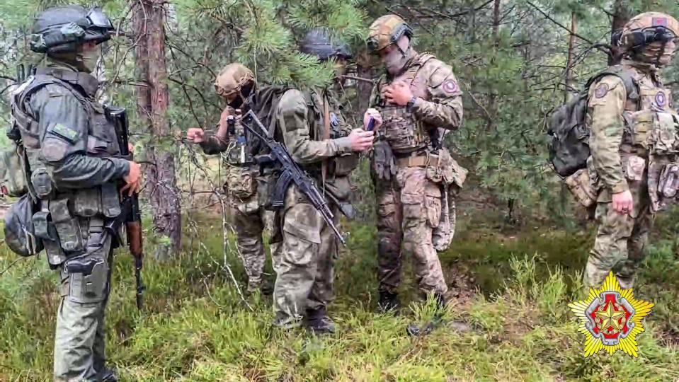 FILE - In this grab taken from video released by Belarus' Defense Ministry on Thursday, July 20, 2023, Belarusian soldiers of the Special Operations Forces (SOF) and mercenary fighters from Wagner private military company attend the weeklong maneuvers conducted at a firing range near the border city of Brest, Belarus. NATO allies located along the alliance’s eastern front are growing increasingly worried about the presence of Russia-linked Wagner group mercenaries in Belarus. (Belarus' Defense Ministry via AP, File)