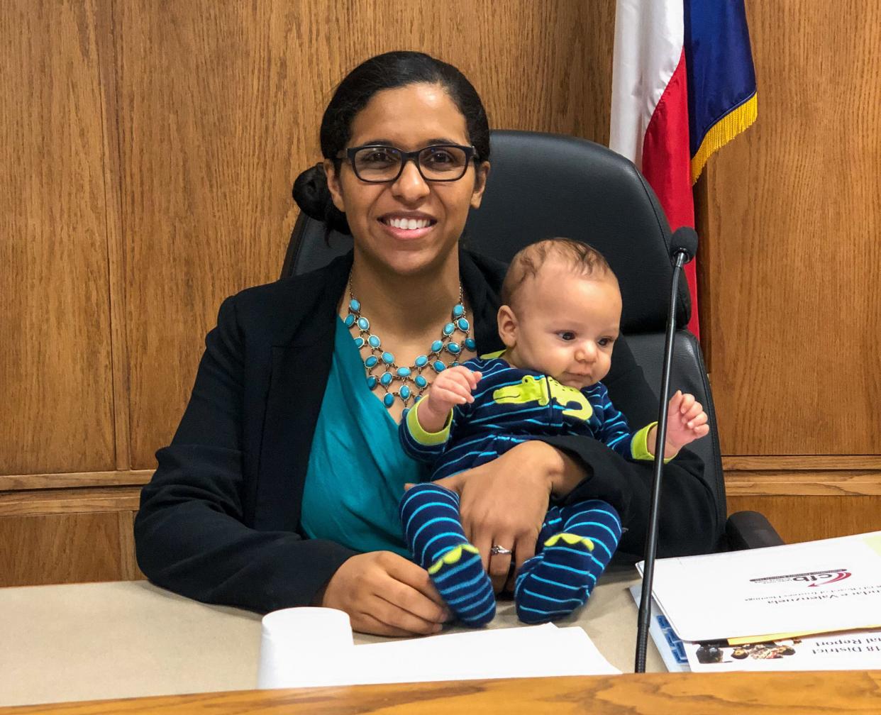 Valenzuela at a Carrollton-Farmers Branch school board meeting in August 2019 with her baby boy. (Photo: Candace Valenzuela)