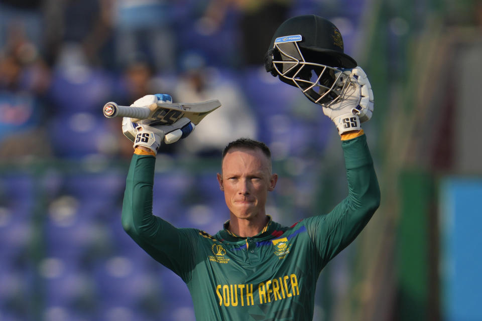 South Africa's Rassi Van Der Dussen celebrates after scoring a century during the ICC Cricket World Cup match between South Africa and Sri Lanka in New Delhi, India, Saturday, Oct. 7, 2023. (AP Photo/Altaf Qadri )
