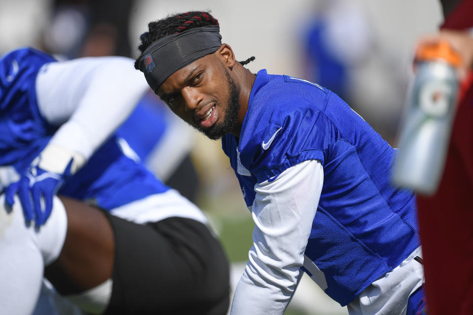 File - Buffalo Bills safety Damar Hamlin warms up during practice at the NFL football team's training camp in Pittsford, N.Y., July 30, 2023. Hamlin is preparing for the next step to resume his career by suiting up in Buffalo's preseason-opening game against the Indianapolis Colts on Saturday, Aug. 12, 2023. (AP Photo/Adrian Kraus, File)