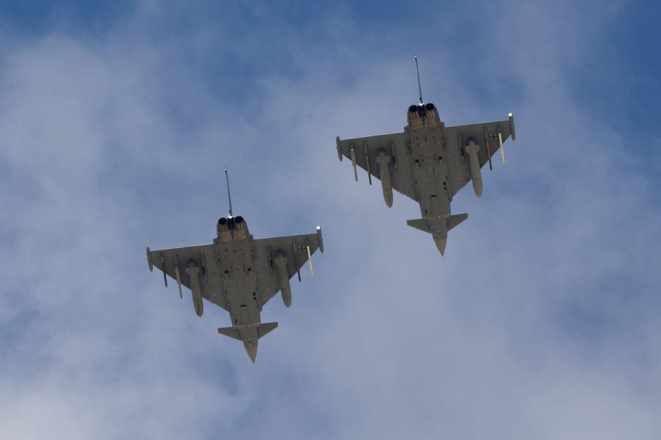 In this Wednesday, Nov. 8, 2017 photo, Two German Eurofighter Typhoon fighter jets fly over Ovda airbase near Eilat, southern Israel during the 2017 Blue Flag exercise. Israel's military is holding the largest ever air drill of its kind with pilots from eight countries (USA, France, Greece, Germany, India, Poland, Italy) simulating combat scenarios. It said Thursday that Germany, India and France are taking part for the first time in the two week drill codenamed 