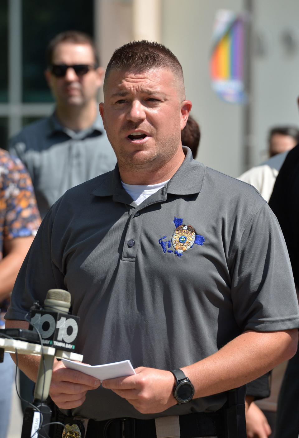 Officer Eric Urbain speaks to the media about some of the provisions the police union is seeking in their current contract negotiations with the City of Sarasota.