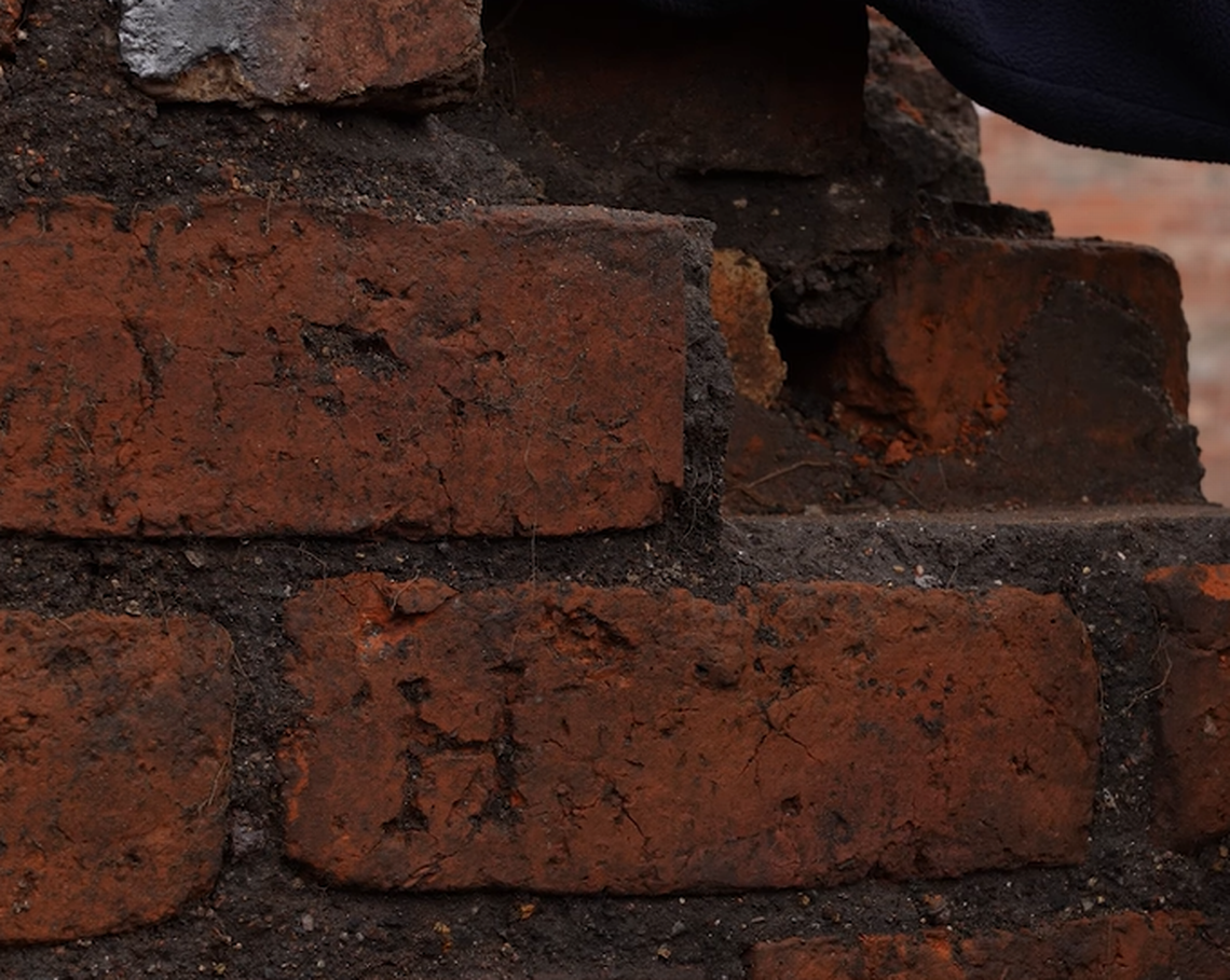 A letter “H” was found carved on a brick in the cellar, a form of graffiti from a steel worker two centuries ago, archaeologists said.