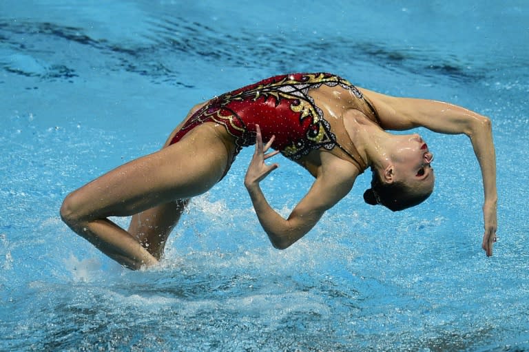 Team Russia competes in the Team Free Combination final event during the synchronised swimming competition at the 2015 FINA World Championships in Kazan, Russia, August 1, 2015