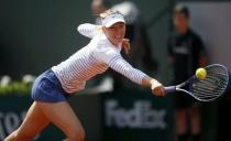 Maria Sharapova of Russia plays a shot to compatriot Vitalia Diatchenko during their women's singles match at the French Open tennis tournament at the Roland Garros stadium in Paris, France, May 27, 2015. REUTERS/Gonzalo Fuentes