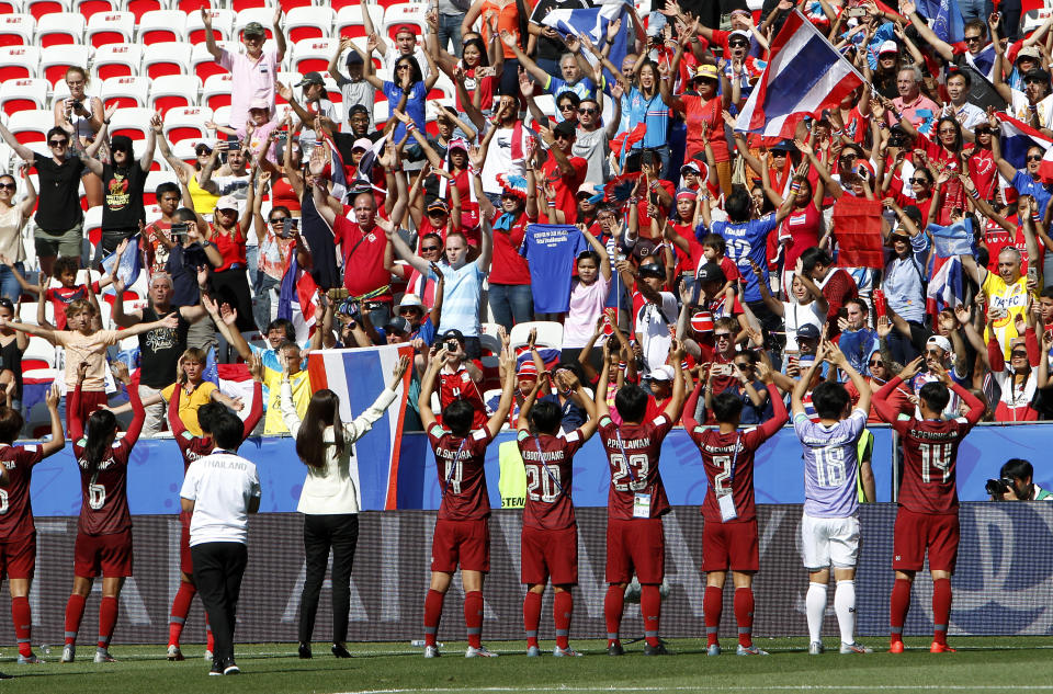 Thailands players celebrate in front of their supporters after the Women's World Cup Group F soccer match between Sweden and Thailand at the Stade de Nice in Nice, France, Sunday, June 16, 2019. Sweden defeated Thailand by 5-1. (AP Photo/Claude Paris)