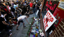 <p>People gather for a vigil for the victims of a mass shooting at an Orlando, Fla., gay club outside of the Stonewall Inn, a famous gay bar, in New York City, June 12, 2016. (EPA/Justin Lane) </p>