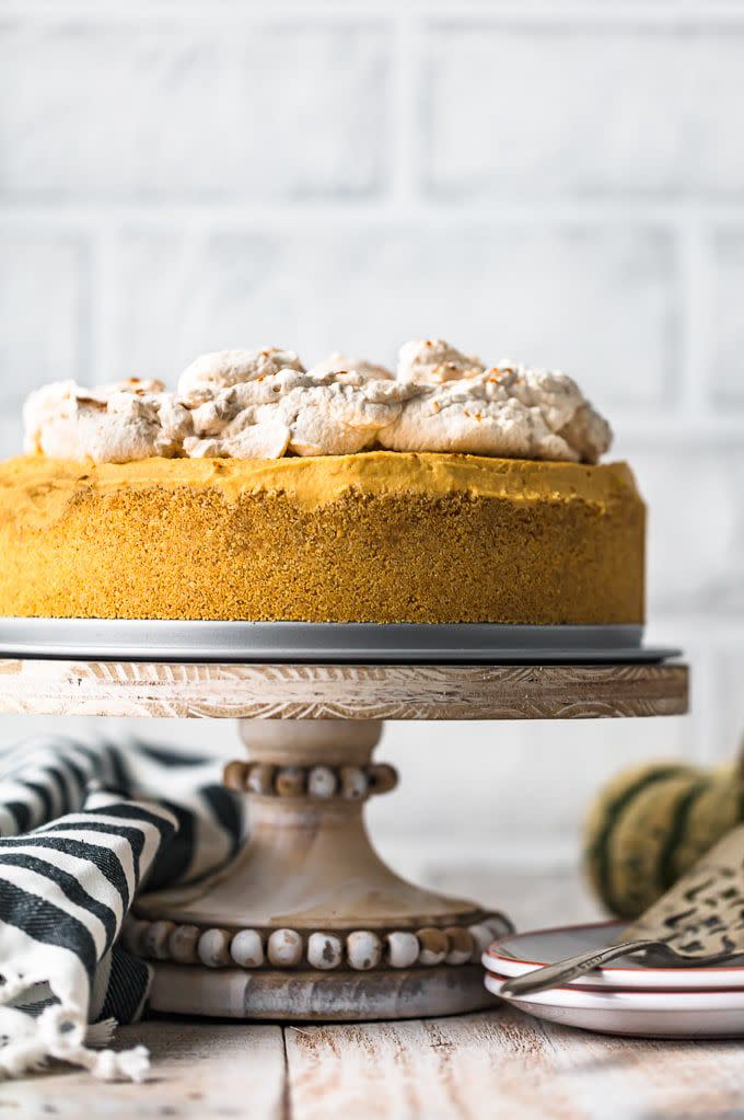 <p>This gorgeous fall dessert features a delectable graham cracker crust. It's finished off with pumpkin spice whipped cream, which you can also use to dress up hot cocoa later in the season.</p><p><strong>Get the recipe at <a href="https://www.thecookierookie.com/pumpkin-pie-cheesecake-recipe/" rel="nofollow noopener" target="_blank" data-ylk="slk:The Cookie Rookie;elm:context_link;itc:0;sec:content-canvas" class="link ">The Cookie Rookie</a>. </strong></p>